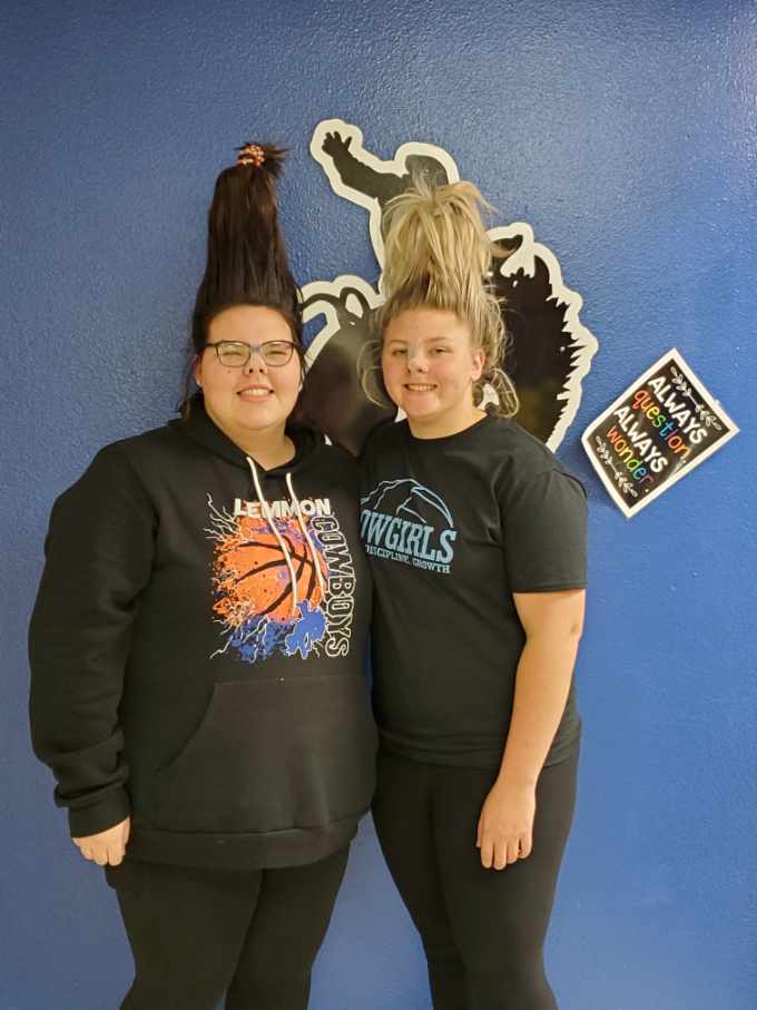 students with hair up in a cone shape like Cindy Lou Who on the Grnich